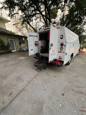 Magnet Plumbing service vehicle on-site for Grease Trap Cleaning in Venice